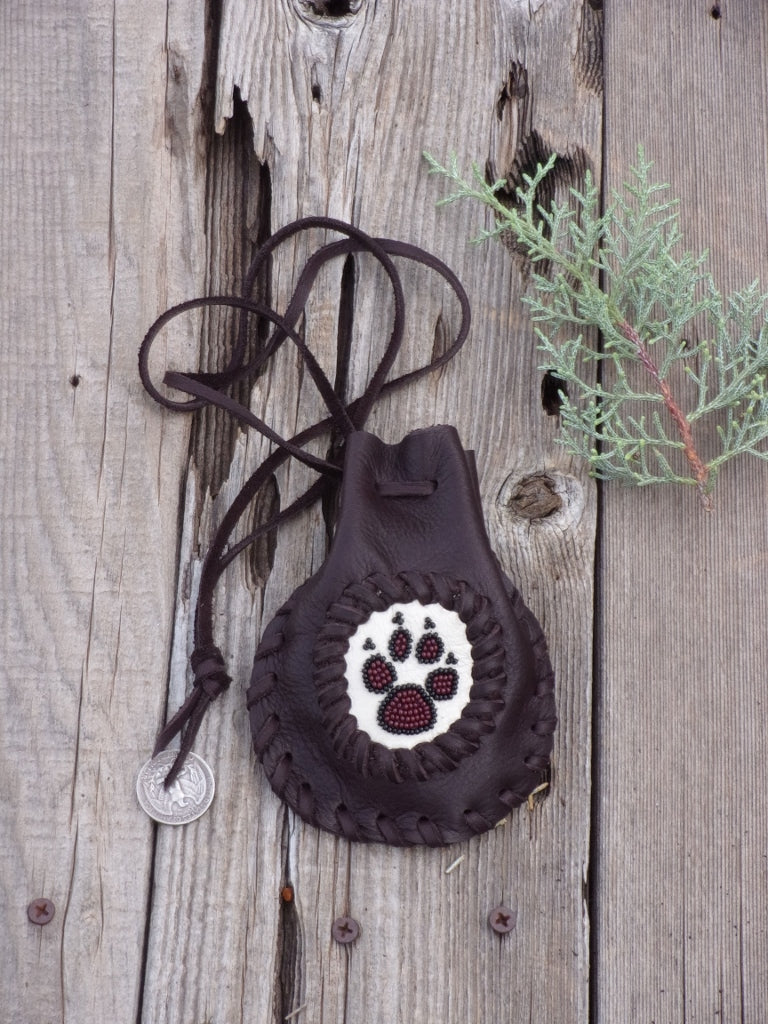 Beaded wolf paw medicine bag , leather amulet bag