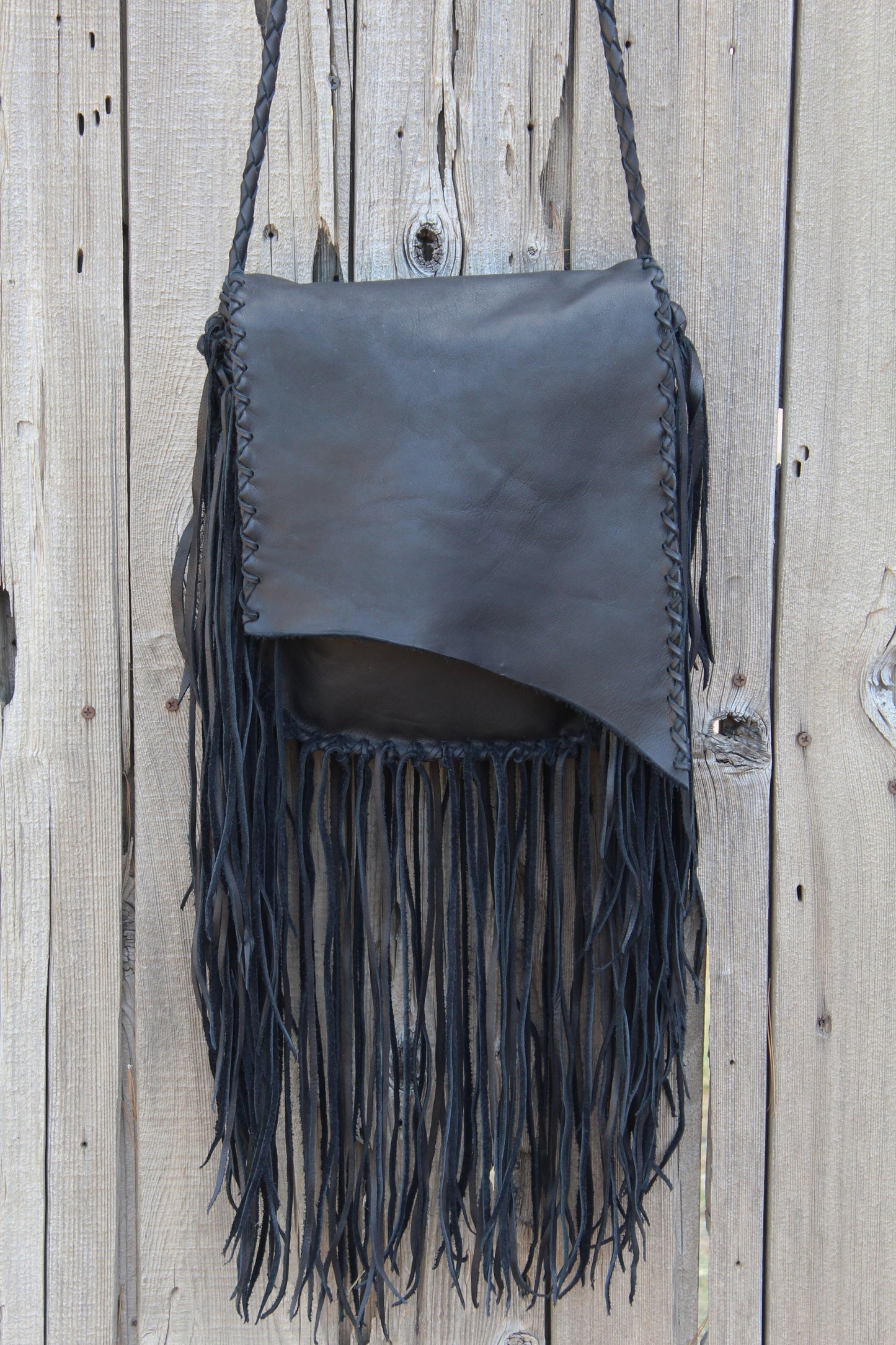 Black leather handbag, fringed leather bag