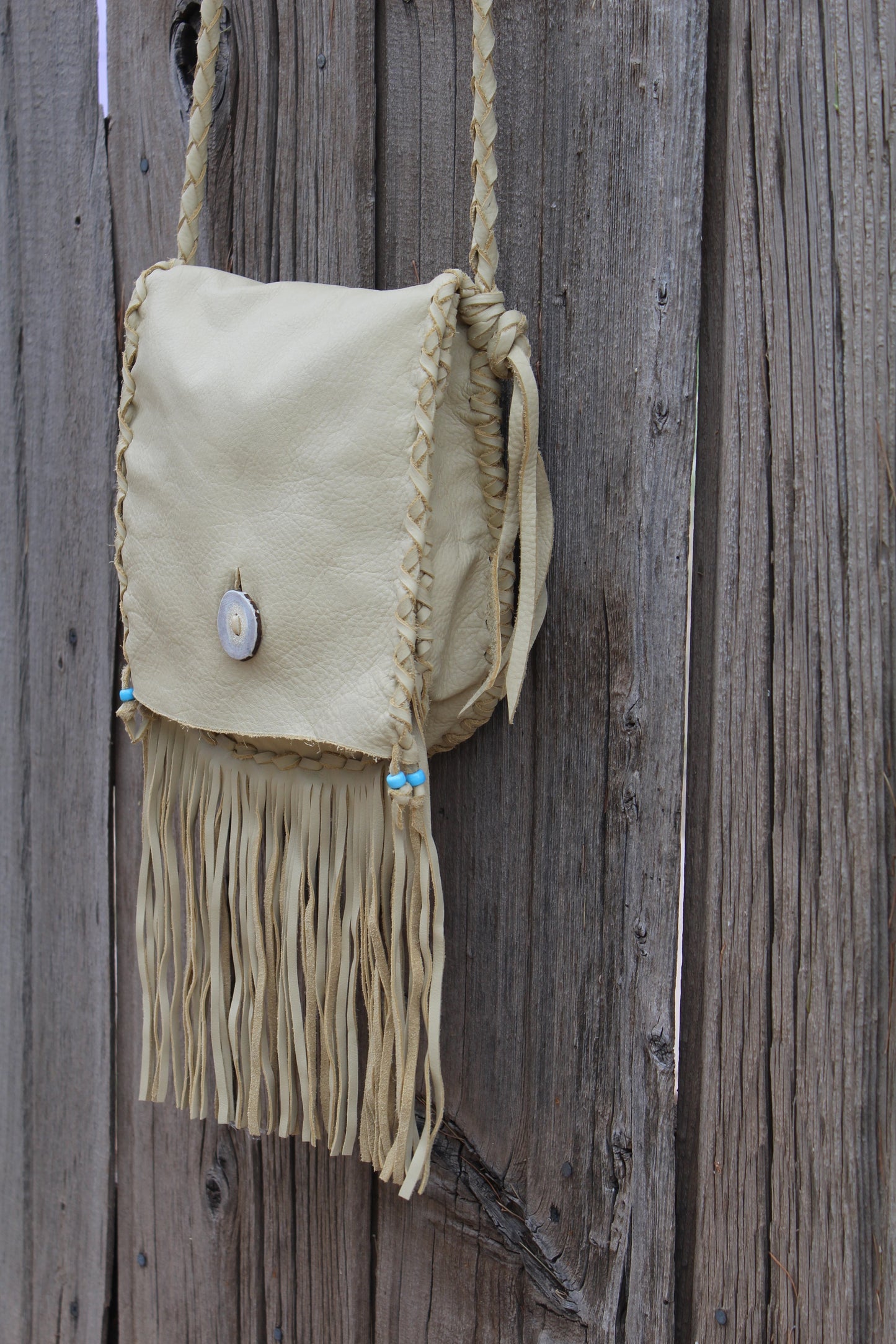 Fringed leather handbag, handstitched leather purse