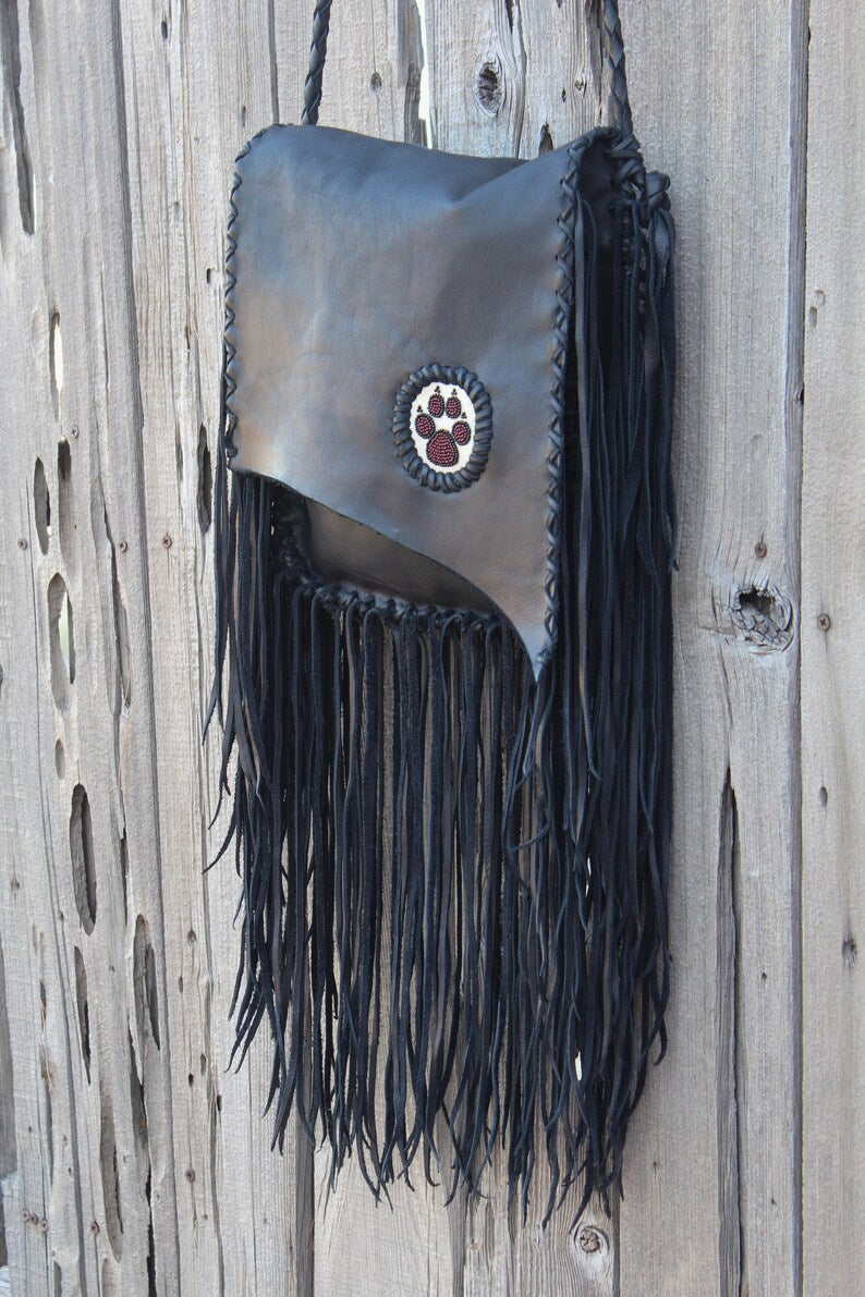 Fringed black handbag, beaded wolf paw handbag
