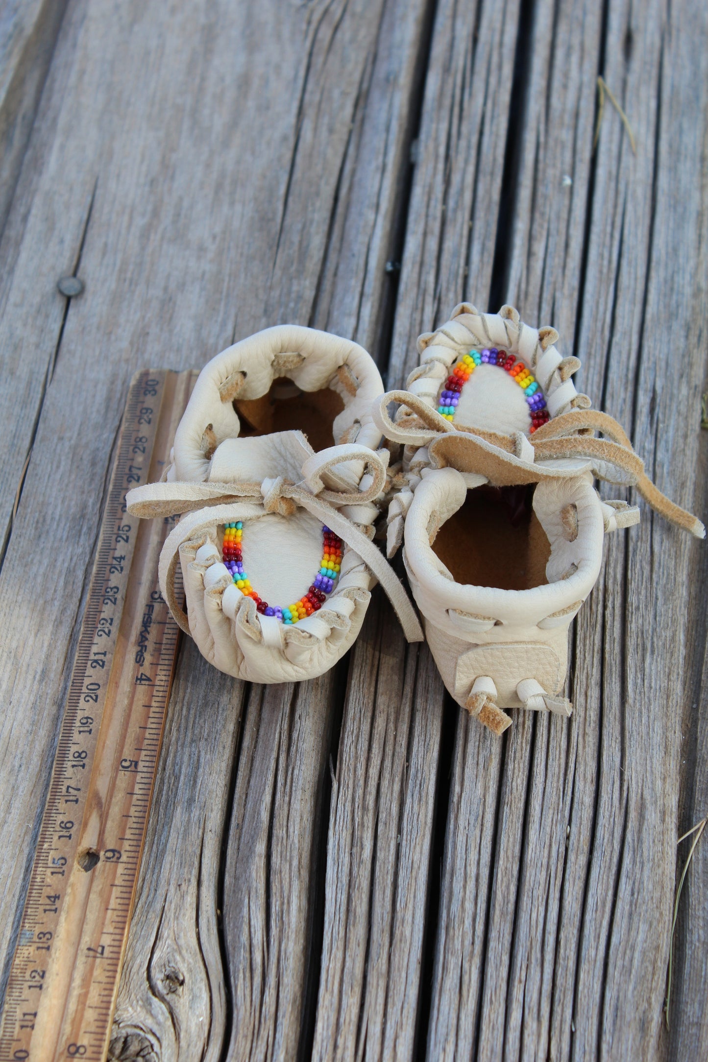 Beaded baby moccasin set with medicine bag