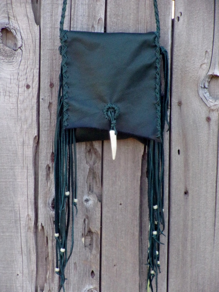 Green leather handbag with fringe and antler closure , Green leather purse with fringe