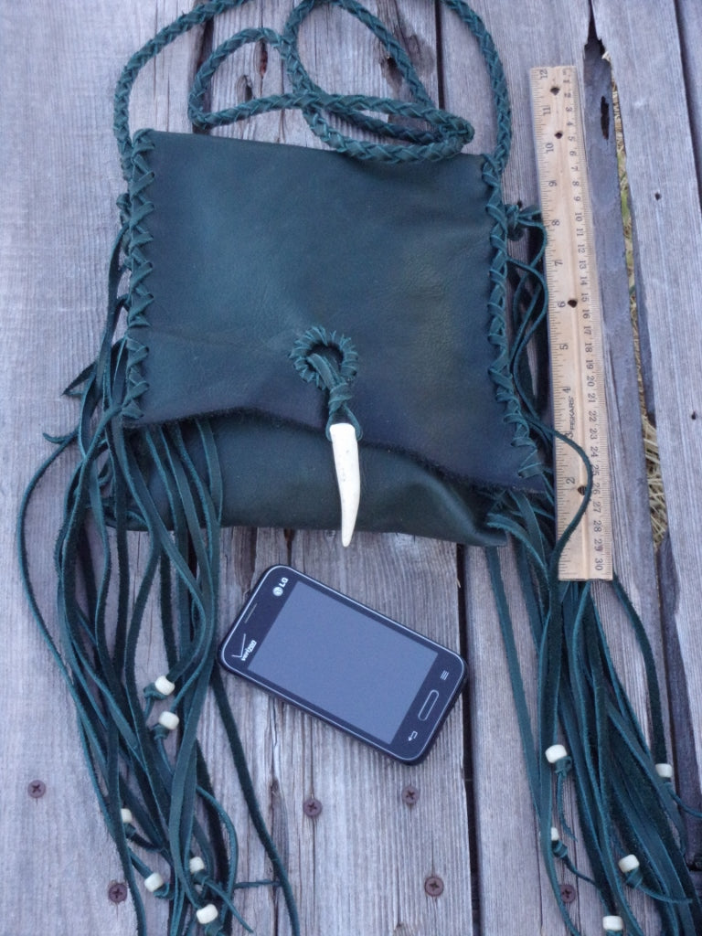 Green leather handbag with fringe and antler closure , Green leather purse with fringe