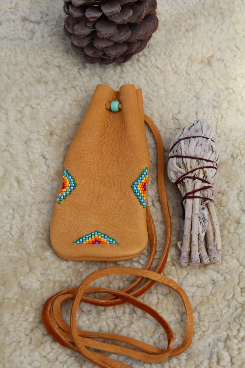 beaded leather pouch, crystal medicine bag