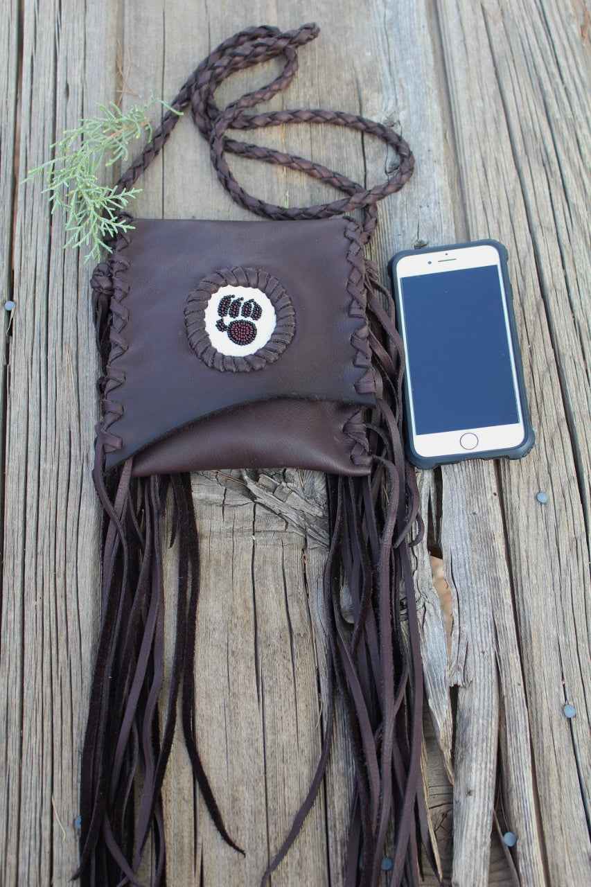 Fringed leather handbag, beaded bear paw bag