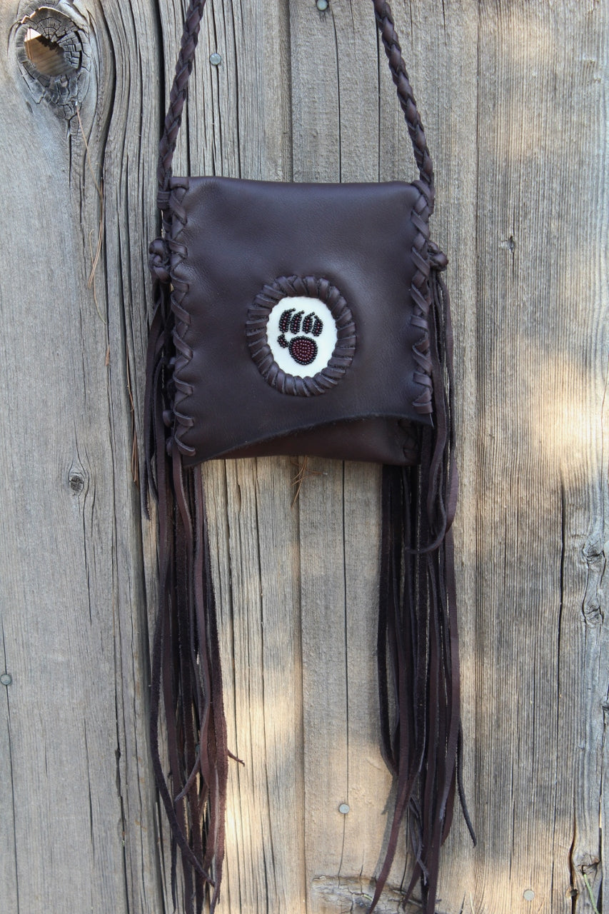 Fringed leather handbag, beaded bear paw bag