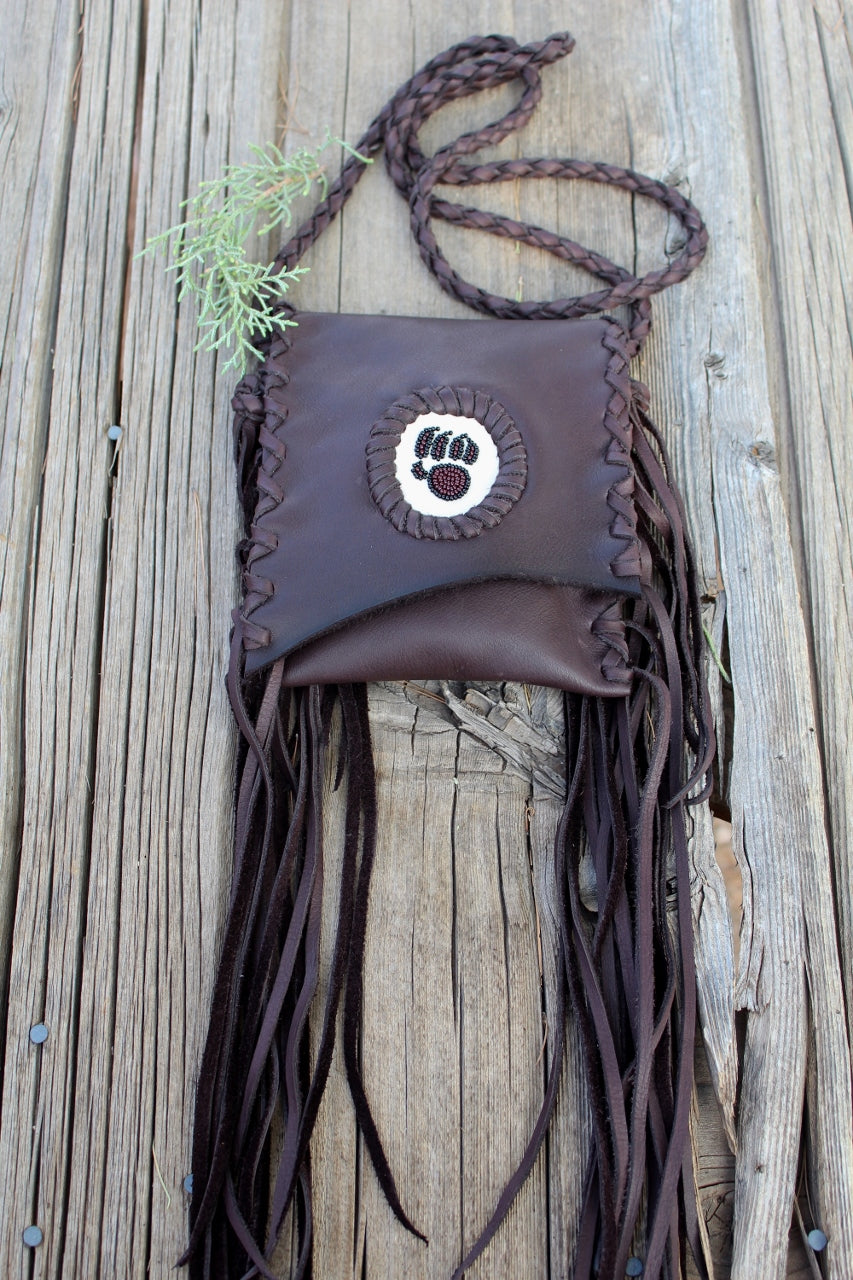 Fringed leather handbag, beaded bear paw bag