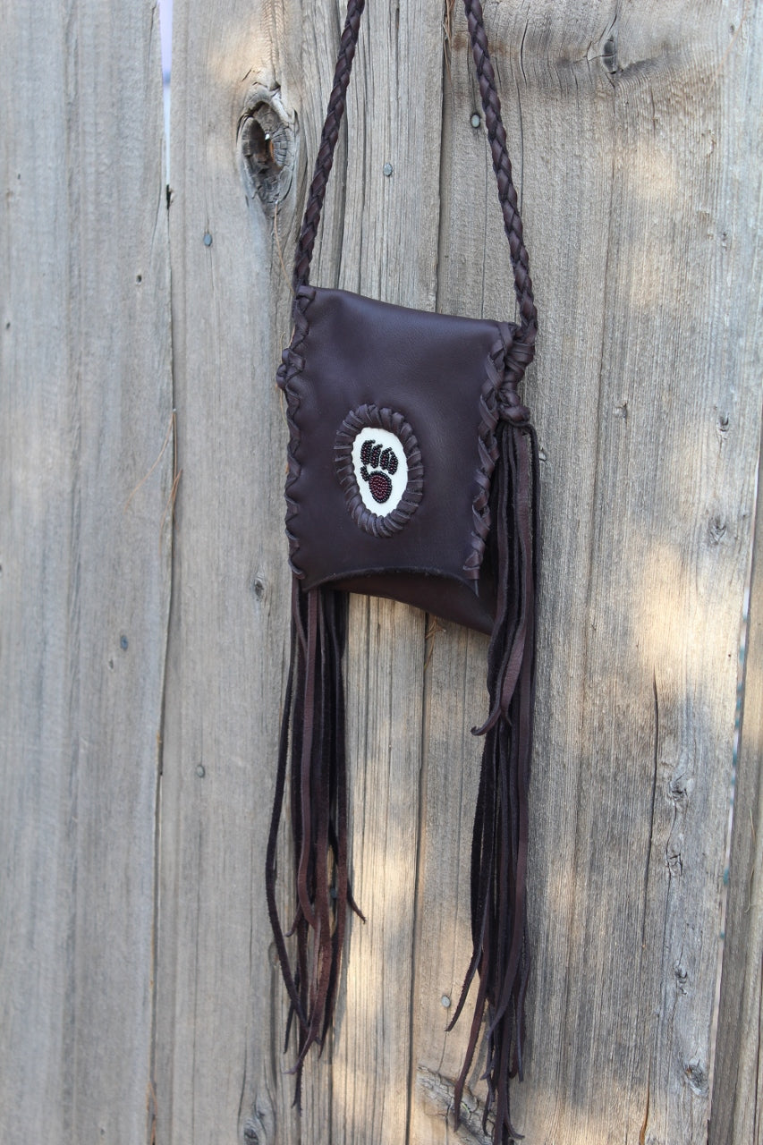 Fringed leather handbag, beaded bear paw bag