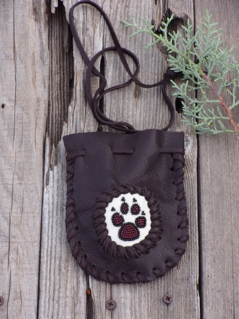 Beaded wolf paw medicine bag , leather amulet bag