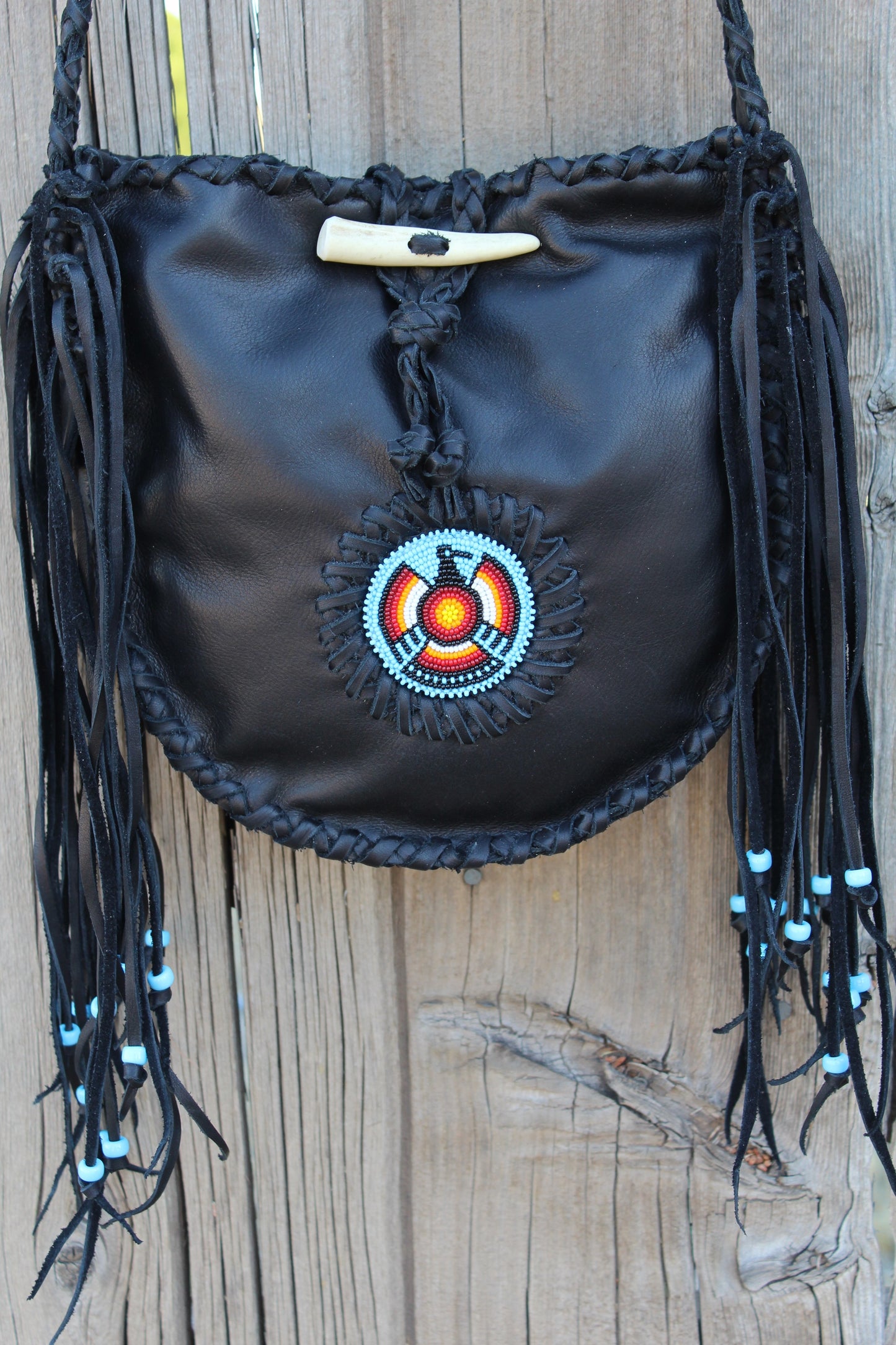 Black leather tote, beaded Thunderbird tote handbag