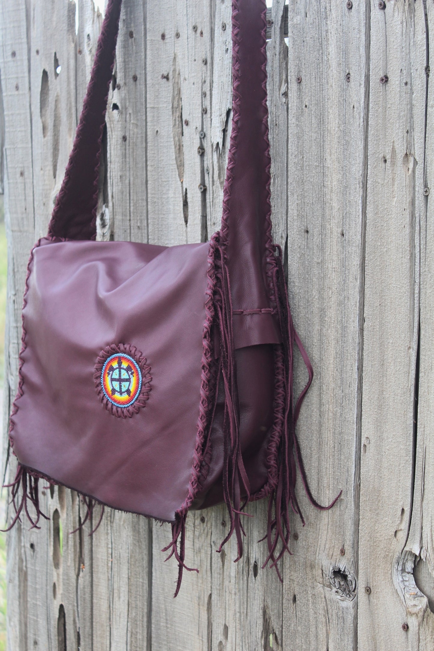 Burgundy leather messenger bag, beaded turtle handbag