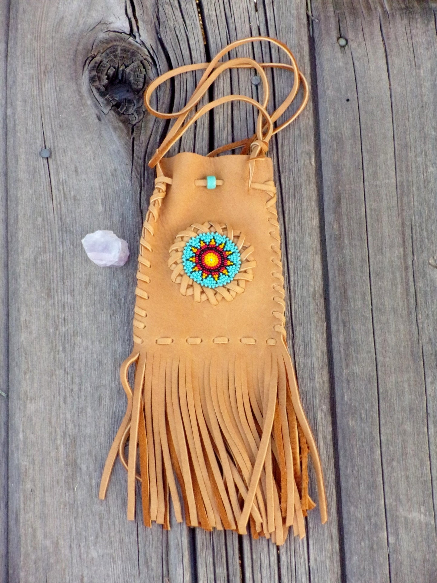 Fringed leather amulet bag, sunflower beadwork