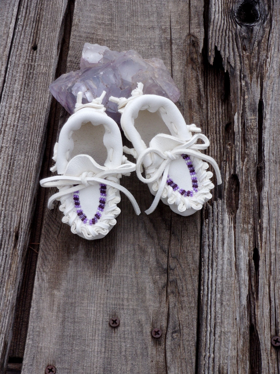 Beaded baby moccasins, white buckskin moccasins