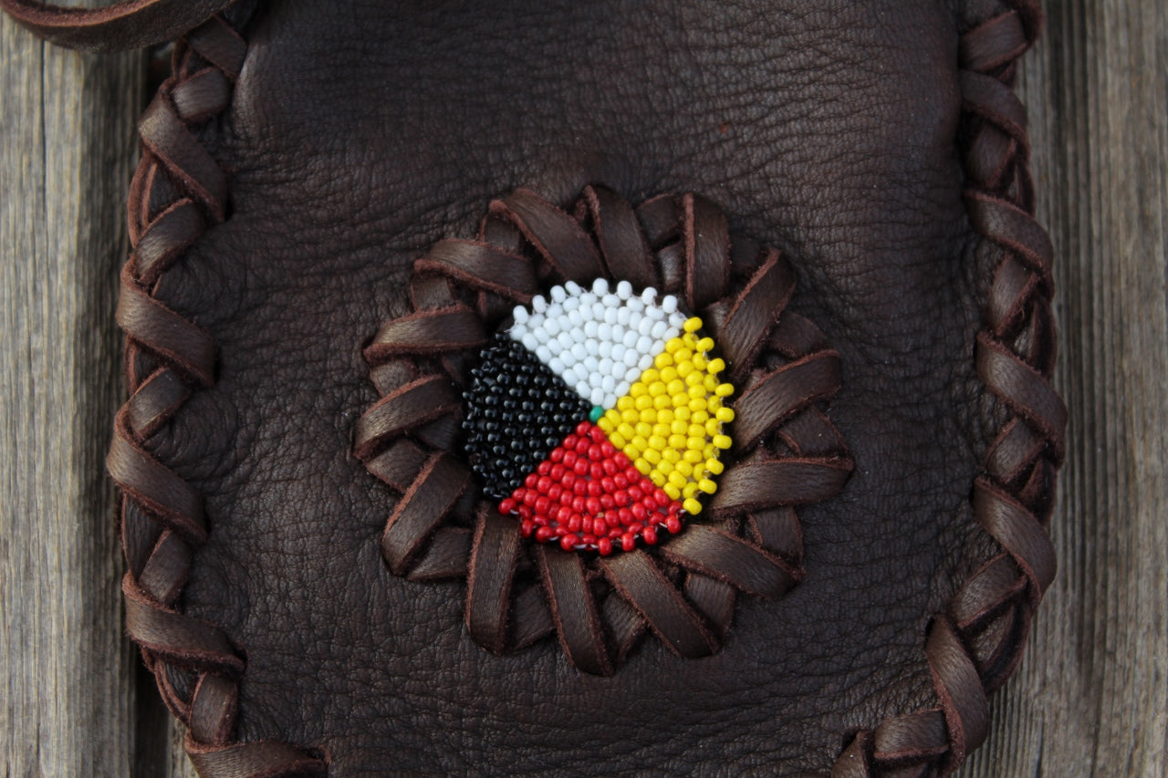 Beaded leather amulet bag with four directions beadwork