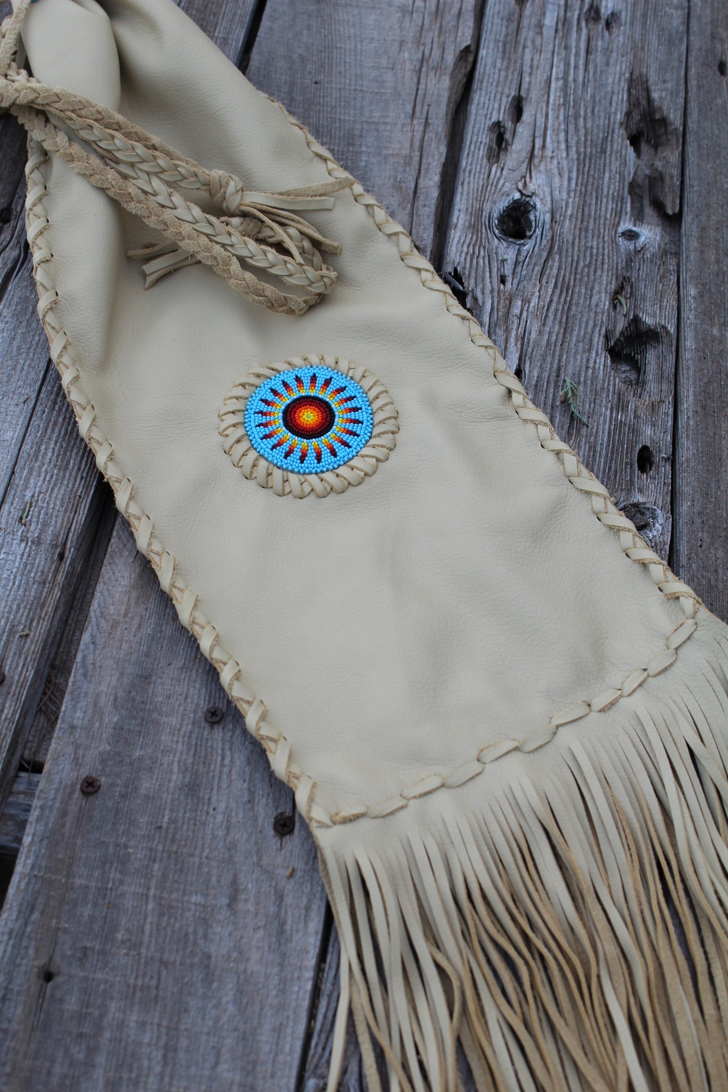 Beaded pipe bag, leather chanupa bag