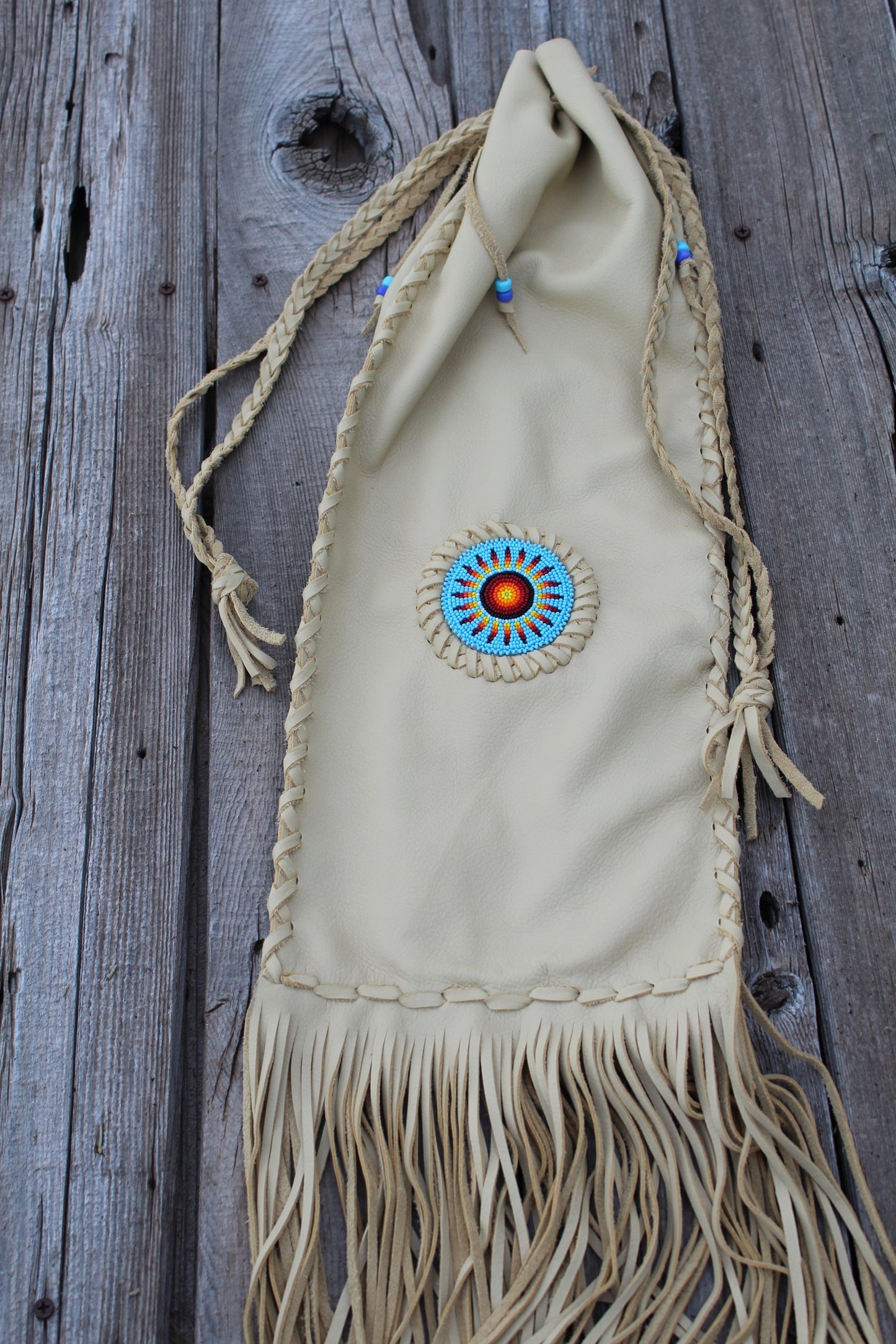 Beaded pipe bag, leather chanupa bag