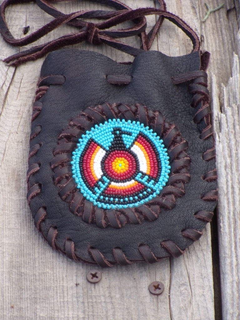 Amulet bag with beaded Thunderbird, necklace bag , leather medicine pouch