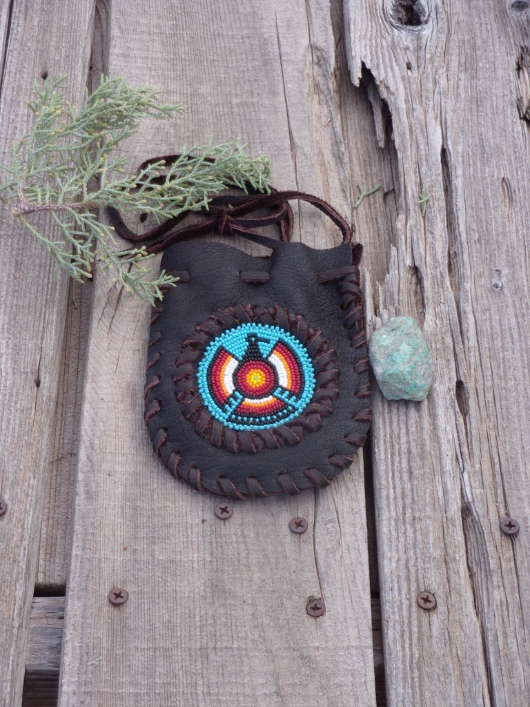 Amulet bag with beaded Thunderbird, necklace bag , leather medicine pouch