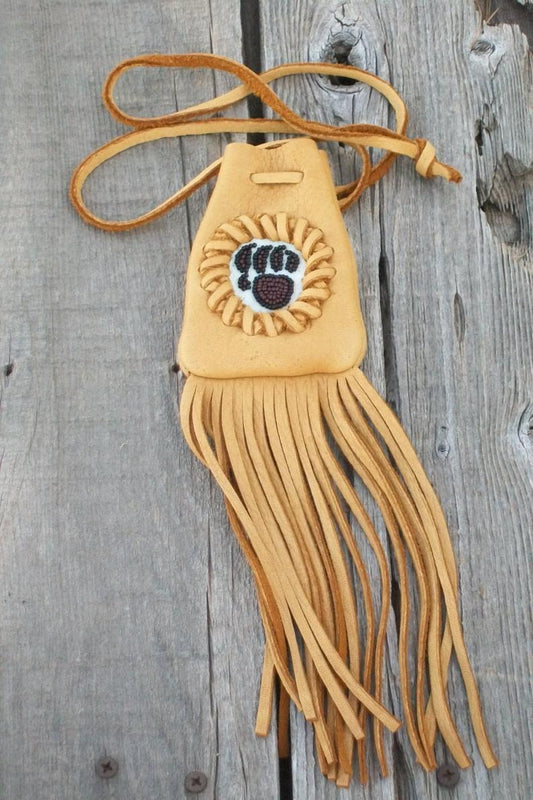 Fringed medicine bag with bear paw totem, leather neck pouch