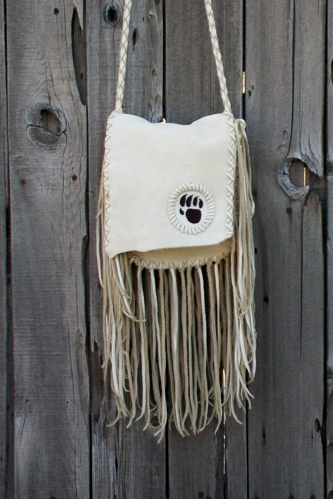 Fringed leather handbag with bear paw totem, totem handbag