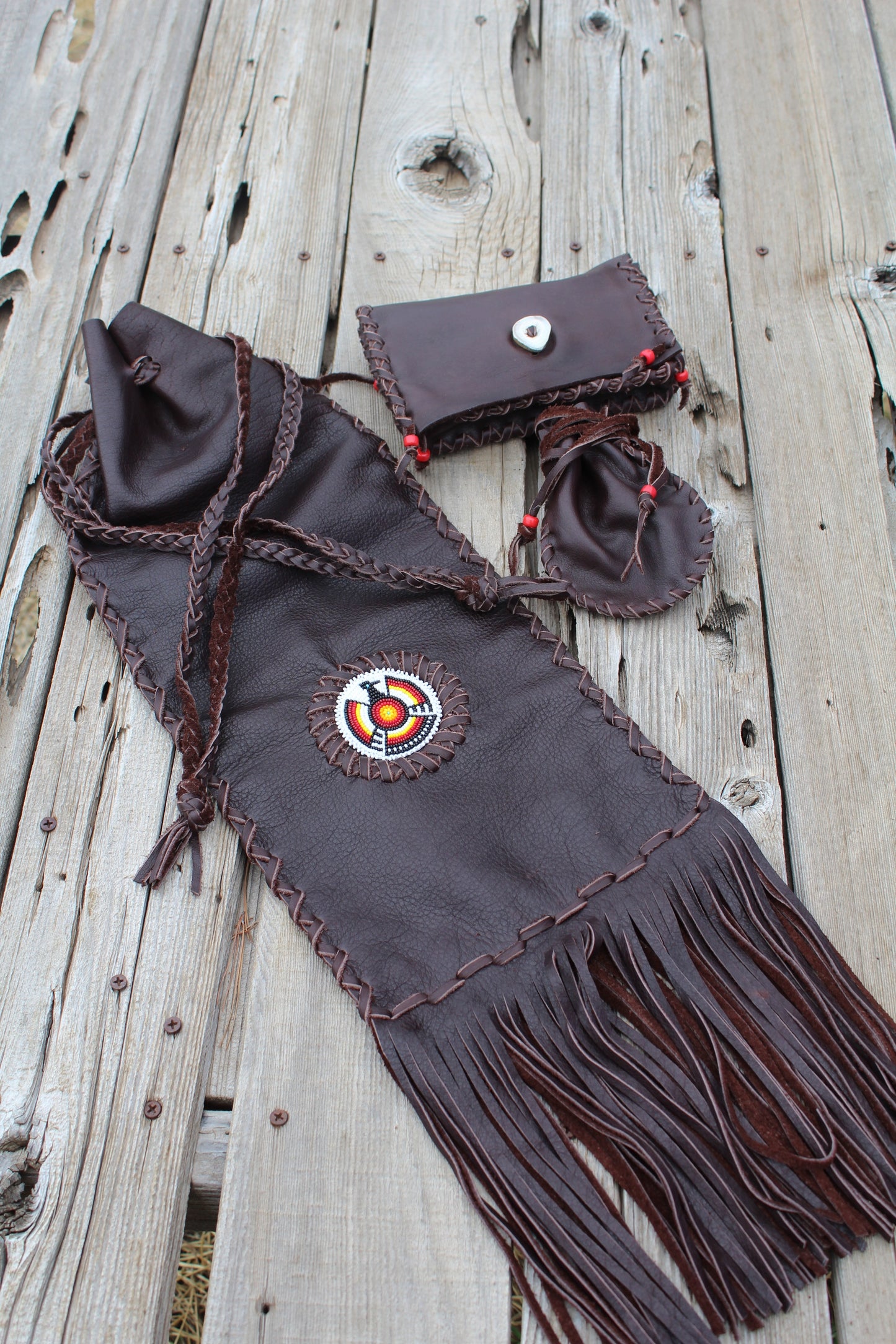 Brown buffalo leather pipe bag set , fringed beaded Thunderbird buffalo bag