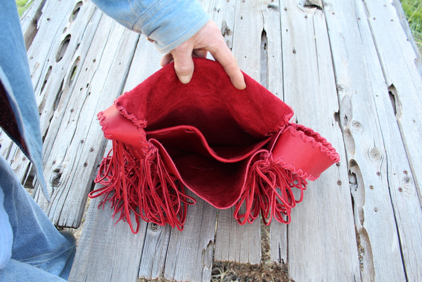 Fringed red leather handbag, soft leather bag