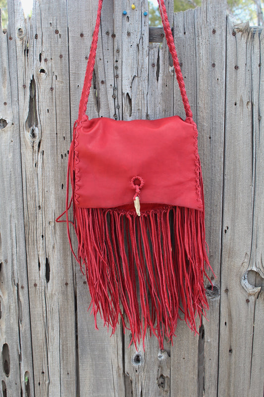 Fringed red leather handbag, soft leather bag