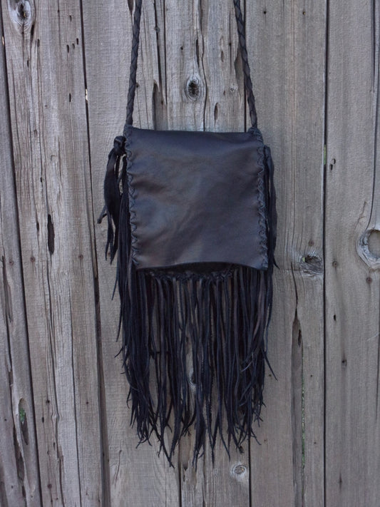 Black leather fringed handbag, bohemian style