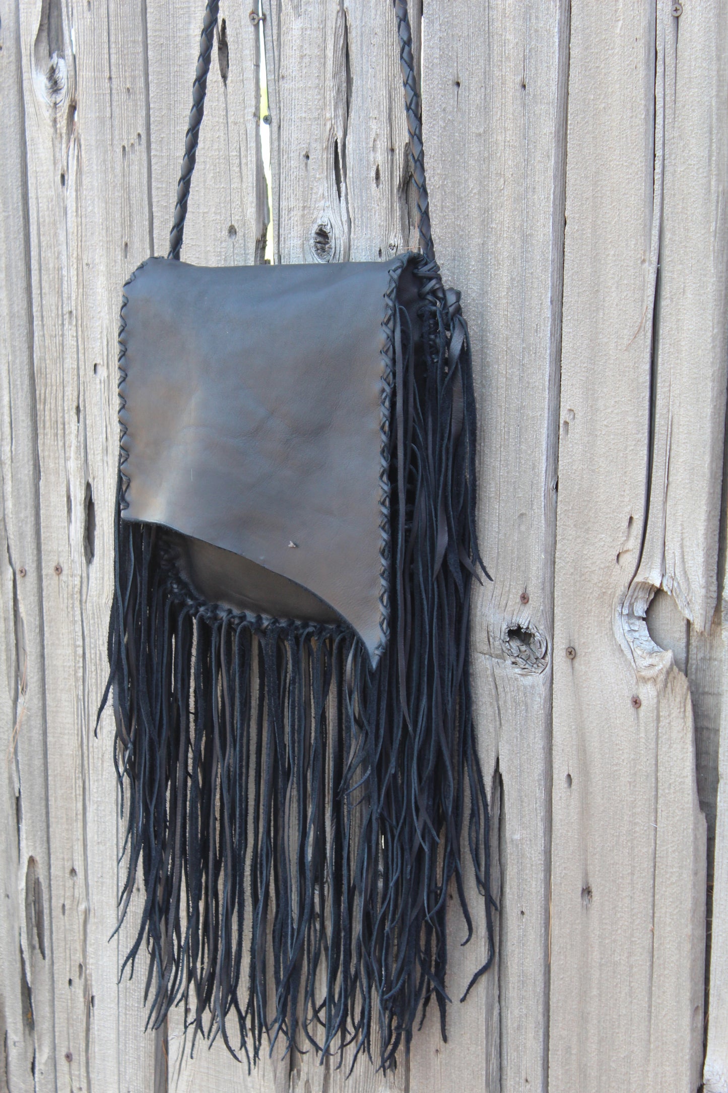 Black leather handbag, fringed leather bag