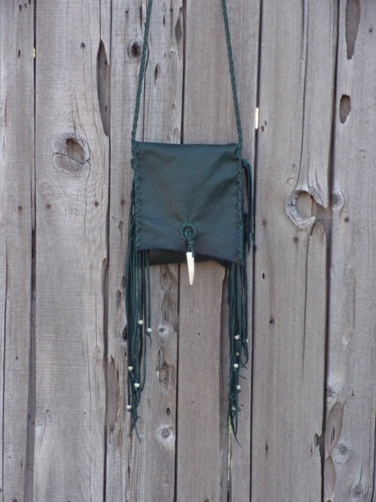 Green leather handbag with fringe and antler closure , Green leather purse with fringe