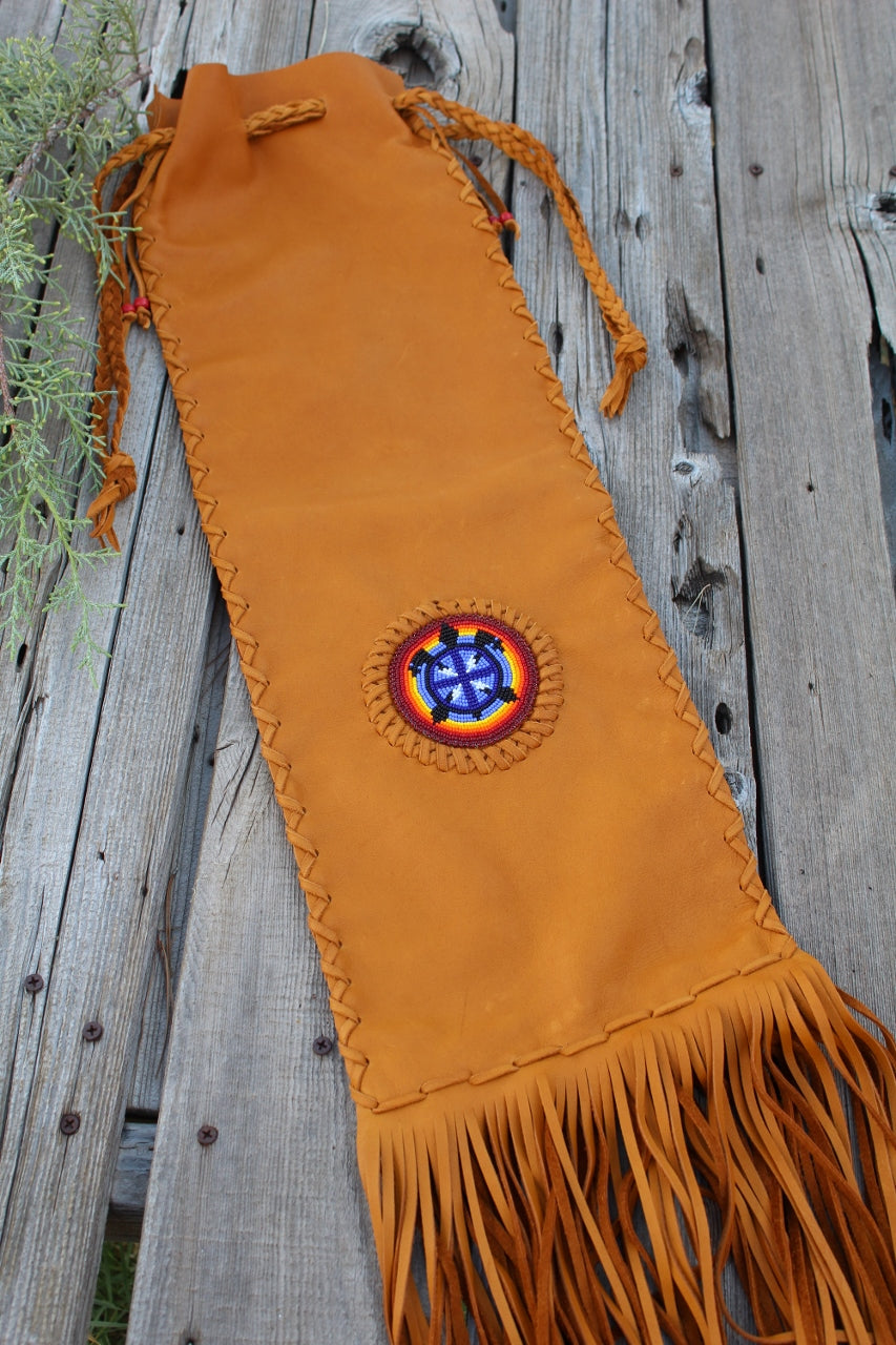 Leather pipe bag with beaded turtle , fringed chanupa bag
