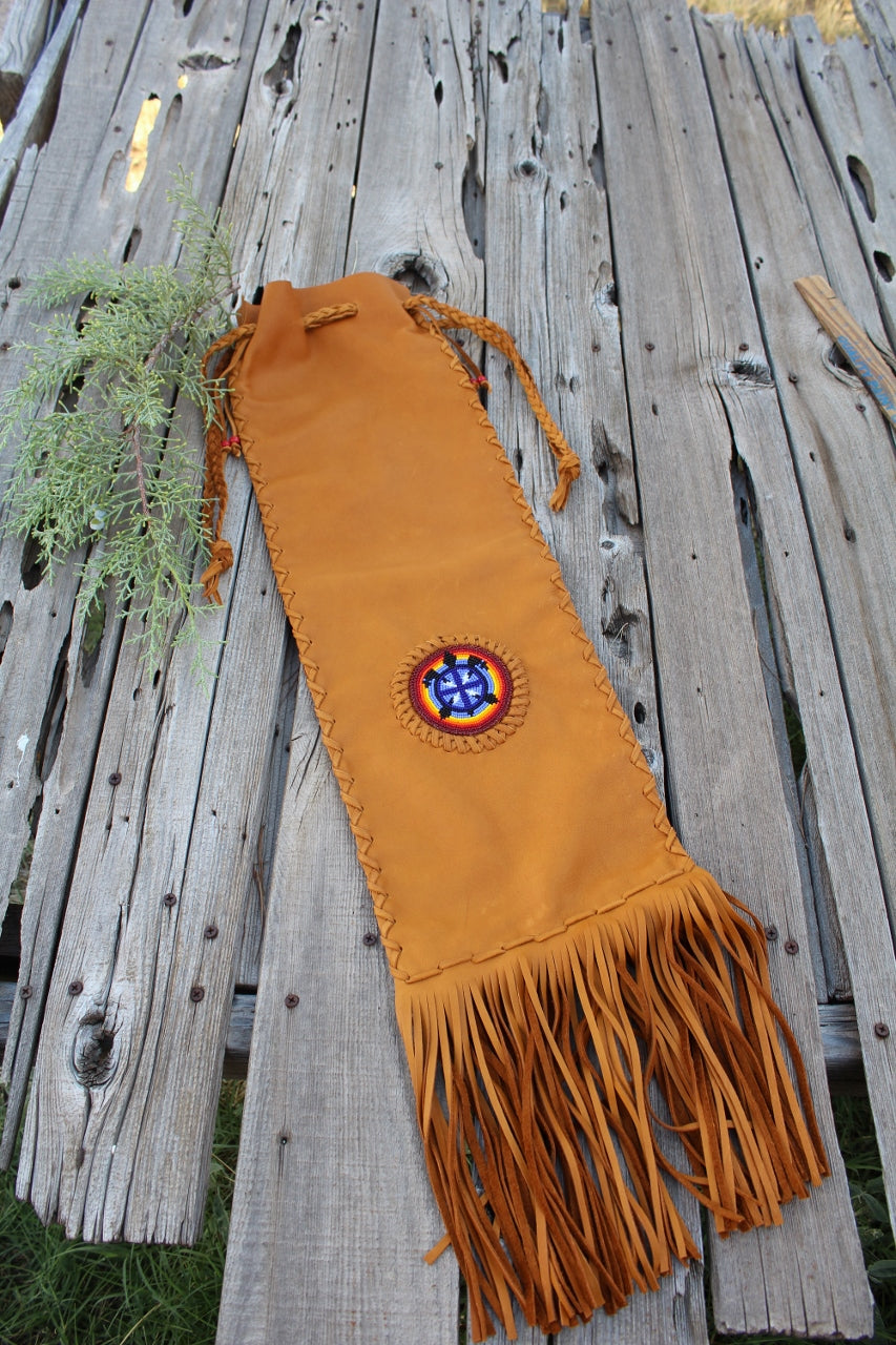 Leather pipe bag with beaded turtle , fringed chanupa bag