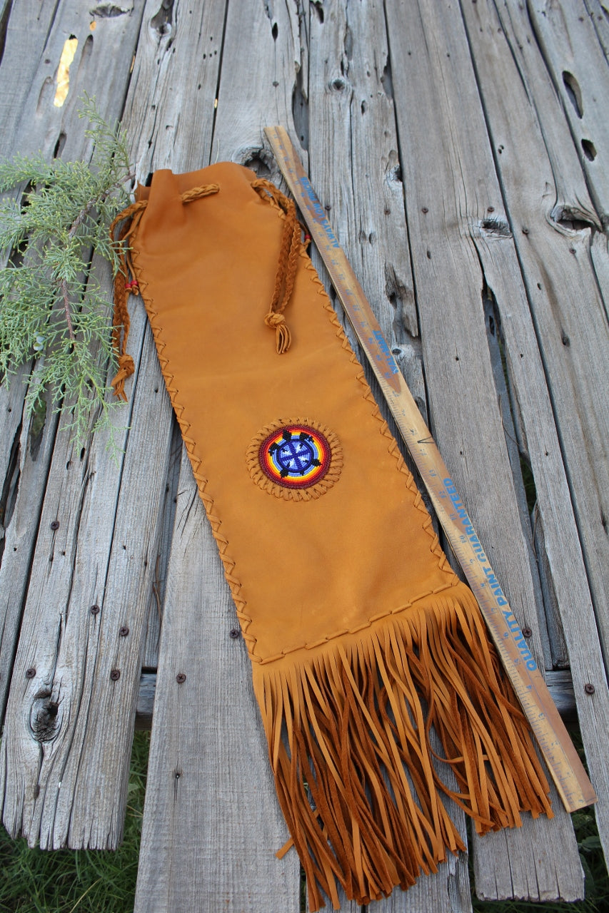 Leather pipe bag with beaded turtle , fringed chanupa bag