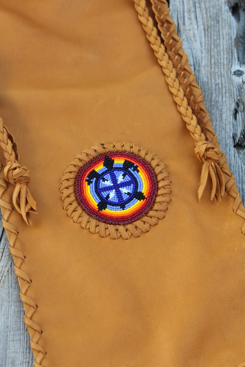 Leather pipe bag with beaded turtle , fringed chanupa bag